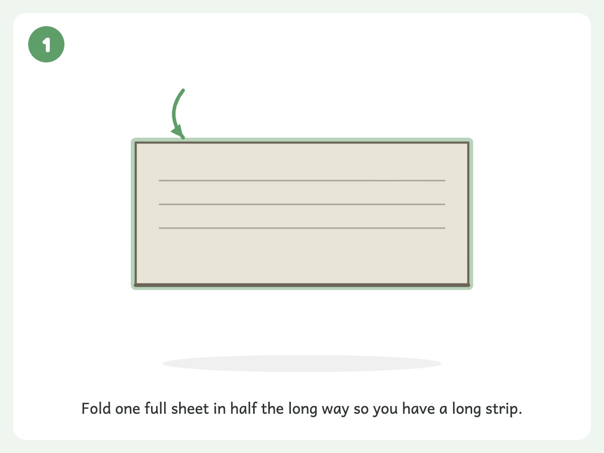 Step 1: Fold a sheet of newspaper in half lengthwise