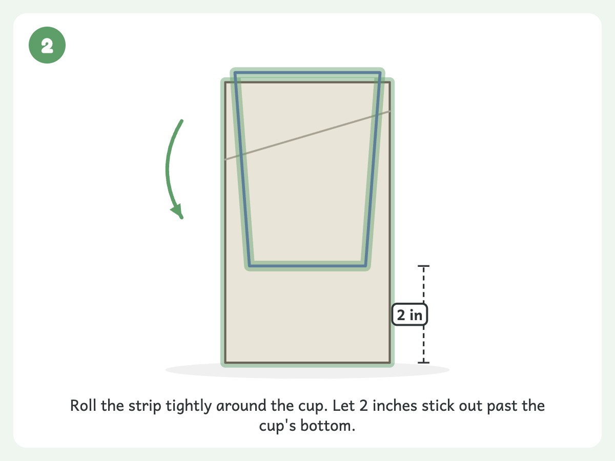 Step 2: Roll the newspaper snugly around the plastic cup, leaving 2 inches past the bottom
